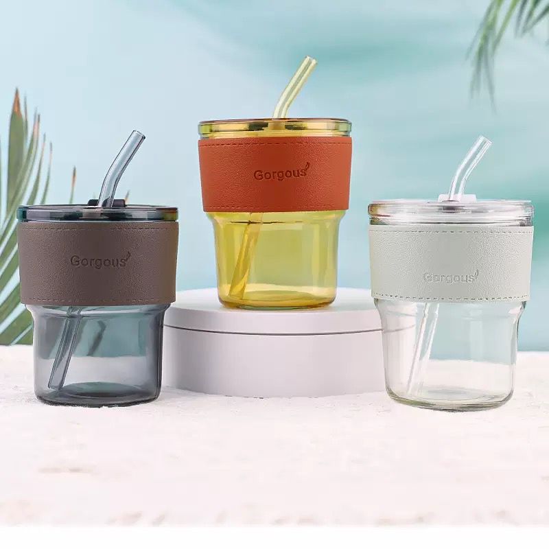 Glass tumbler with lid and glass straw